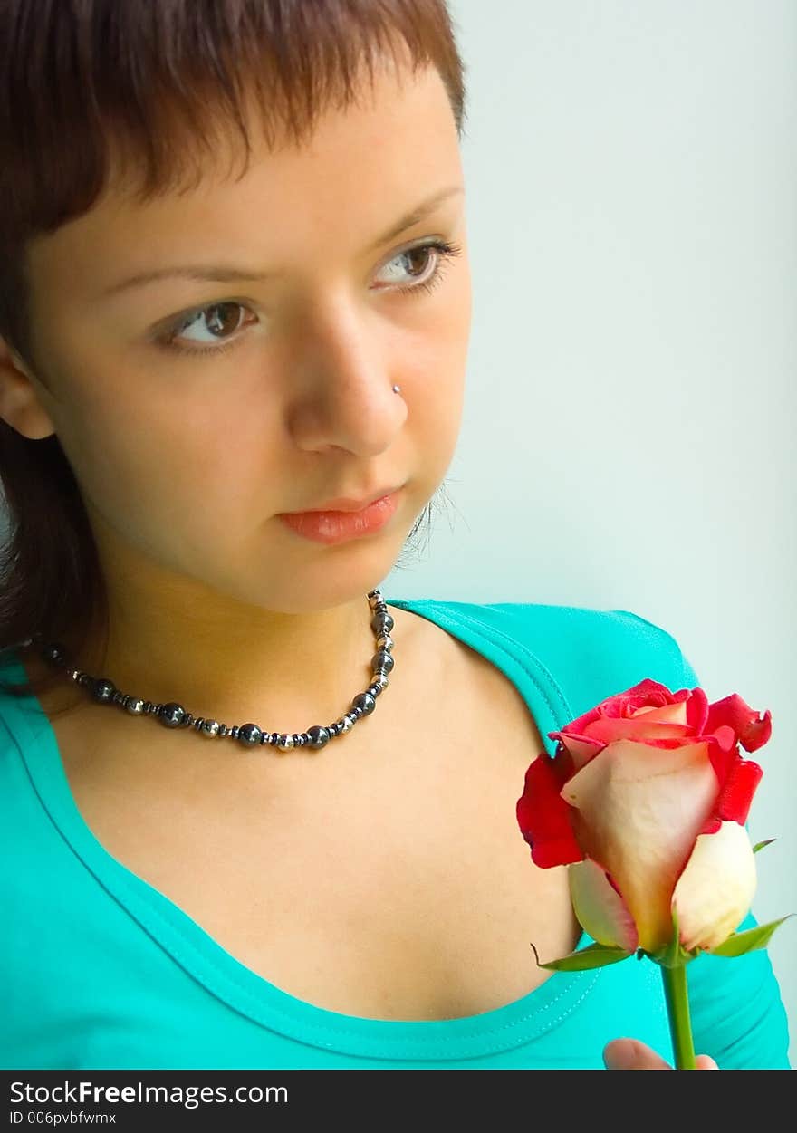 Pretty girl with rose