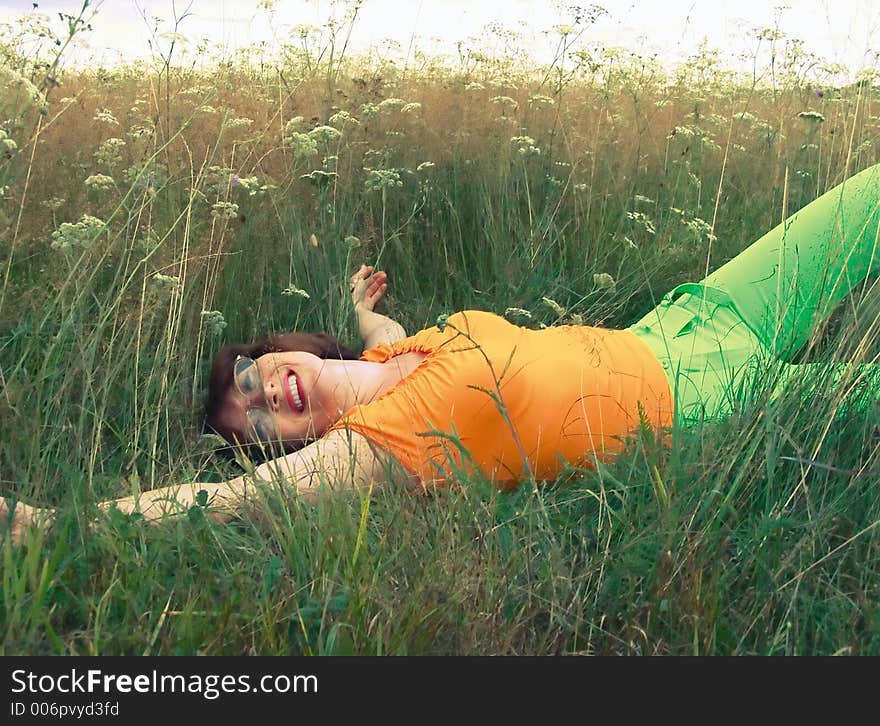 Girl reposes on grass. Girl reposes on grass