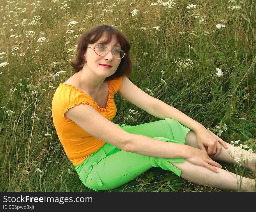 Girl reposes on grass. Girl reposes on grass