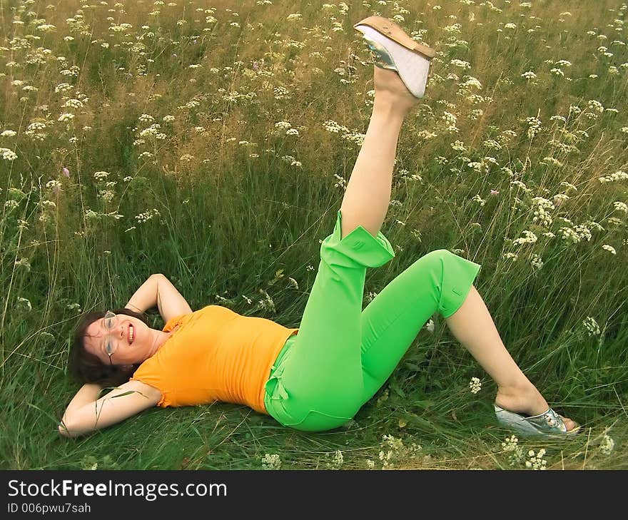 Girl reposes on grass. Girl reposes on grass