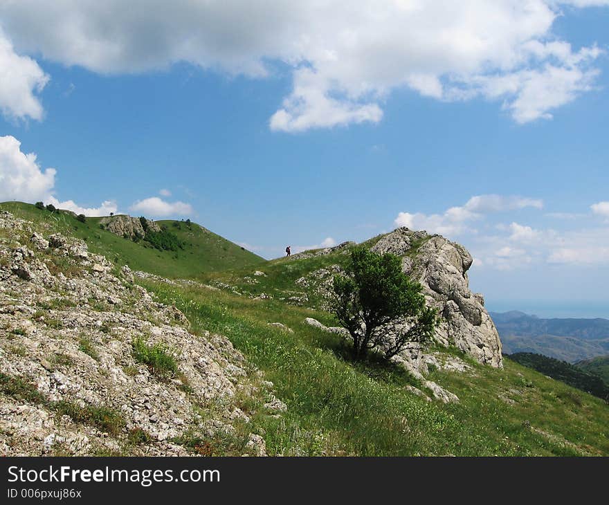 People on the green mountain