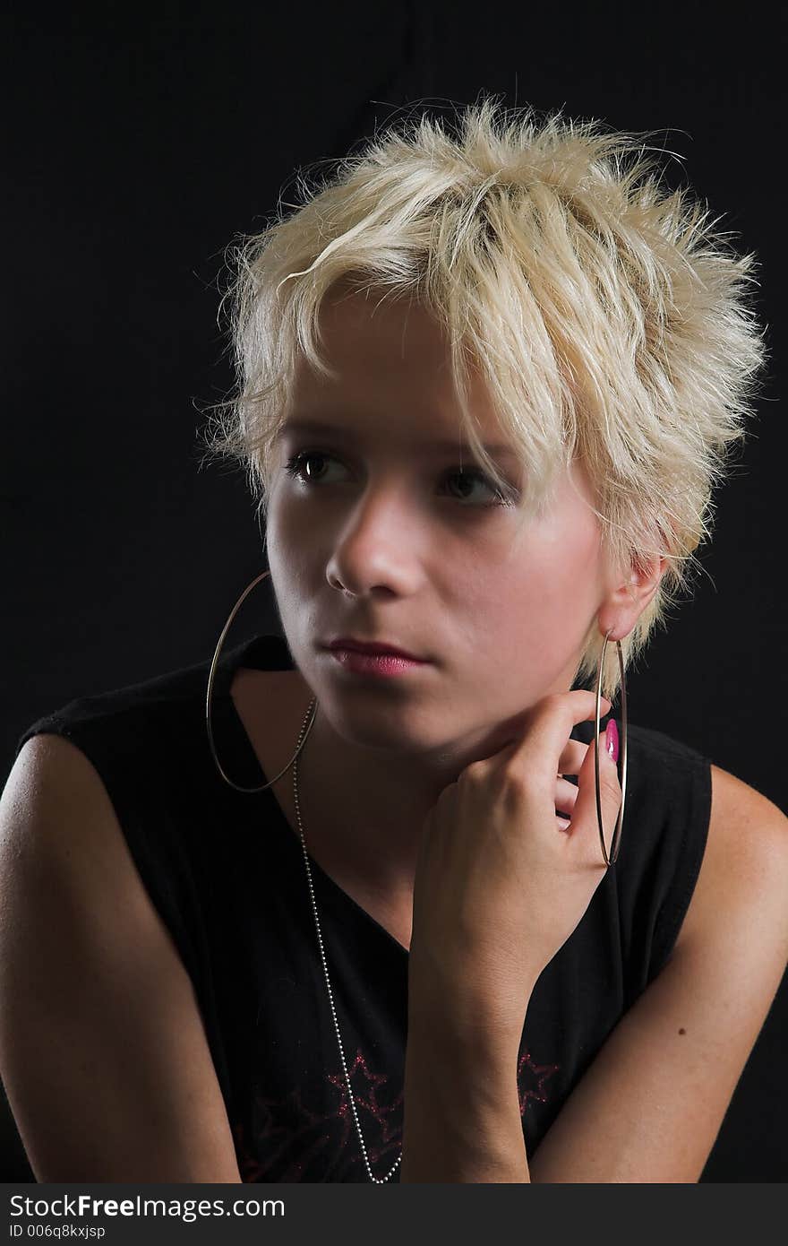 Portrait of beautiful young sexy woman on black background