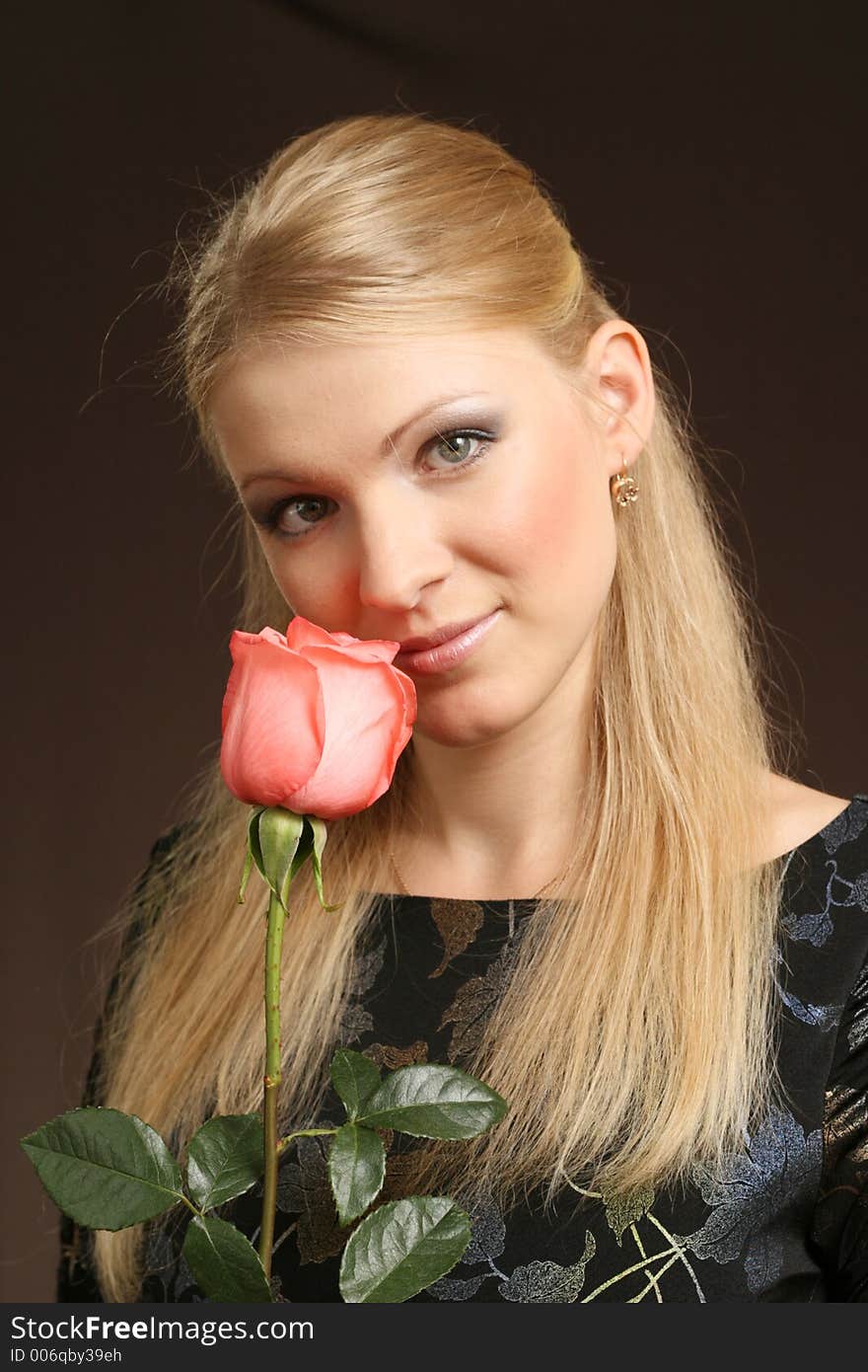 Young woman on dark background. Young woman on dark background