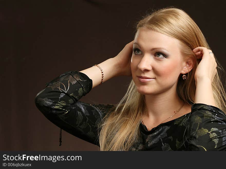 Young woman on dark background. Young woman on dark background