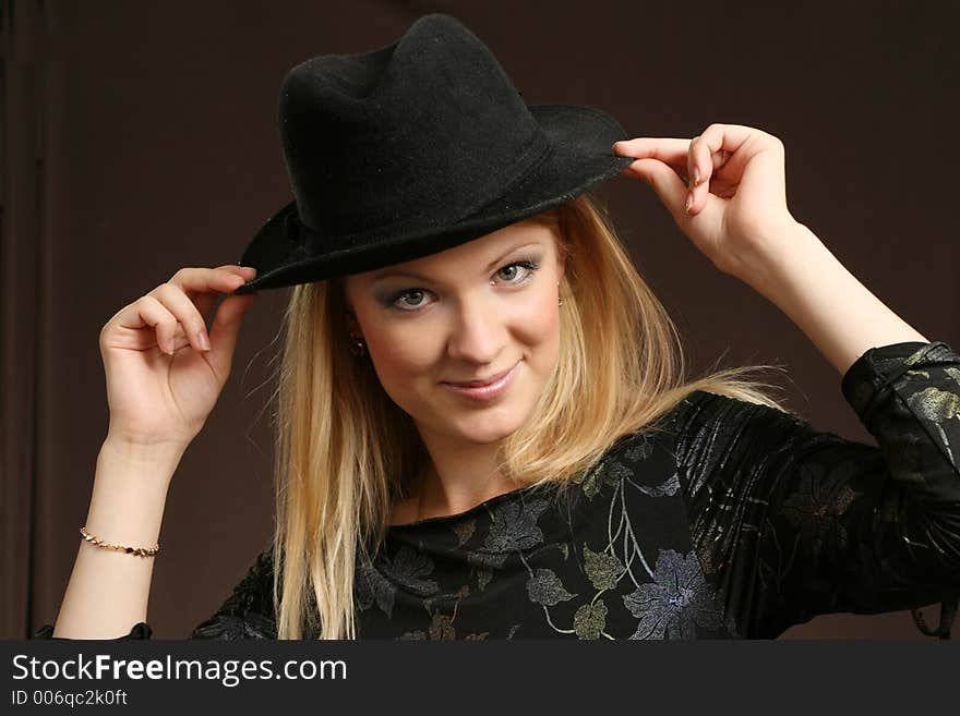 Young woman on dark background. Young woman on dark background