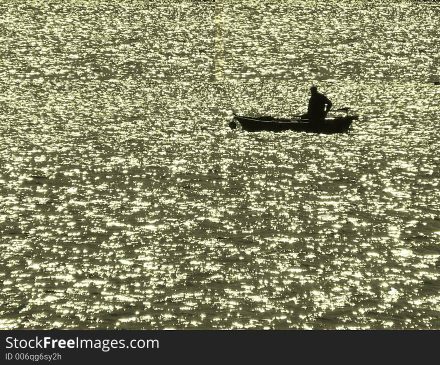 Fisherman on Lake Montbel, south west France. Fisherman on Lake Montbel, south west France