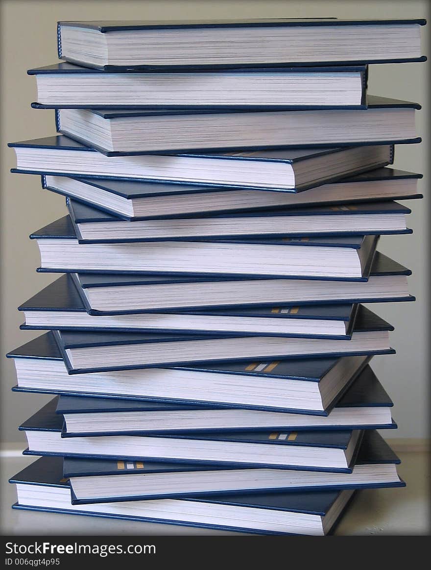 Stack of blue encyclopedias with white background. Stack of blue encyclopedias with white background.