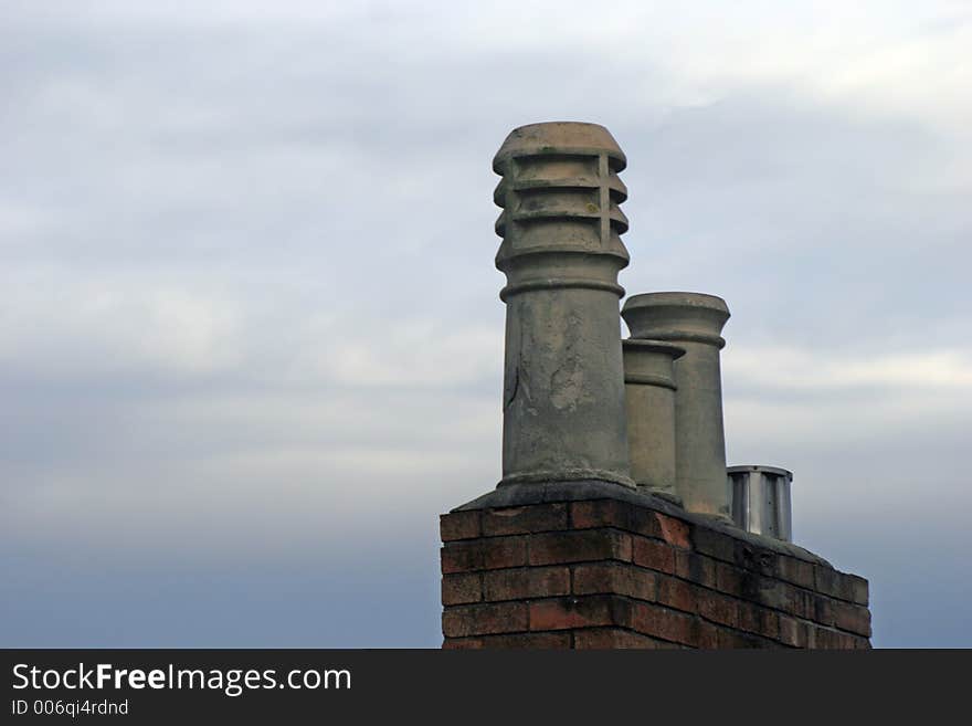 Chimney and stack at dusk. Chimney and stack at dusk