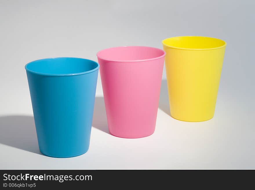 THree cups in the colors Yellow, Magenta and Cyan. Black is missing. THree cups in the colors Yellow, Magenta and Cyan. Black is missing.