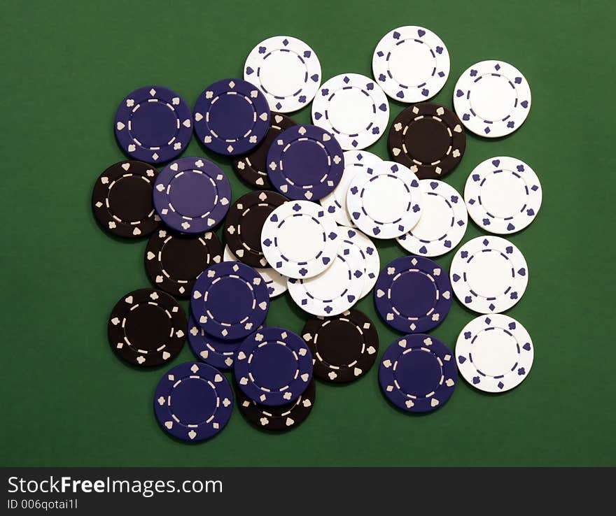 Casino Chips on Green Background