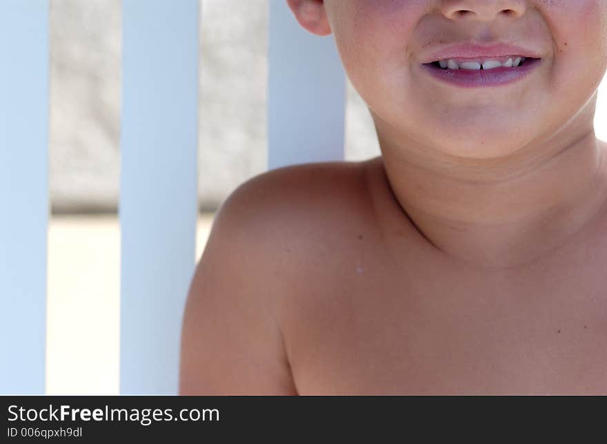 Boy on a porch swing