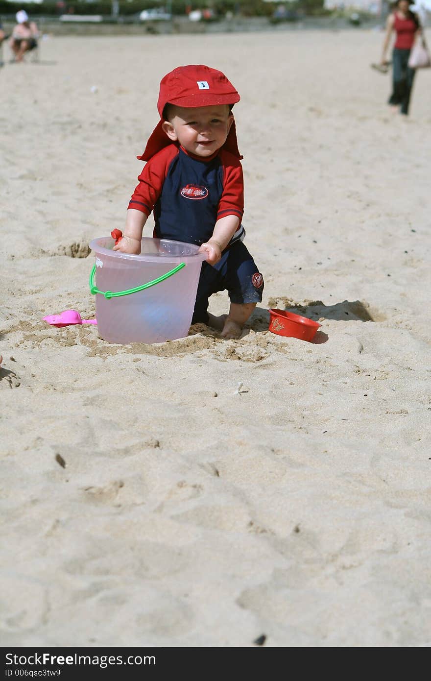 Small child exploring a beach in Cornwall. Small child exploring a beach in Cornwall.