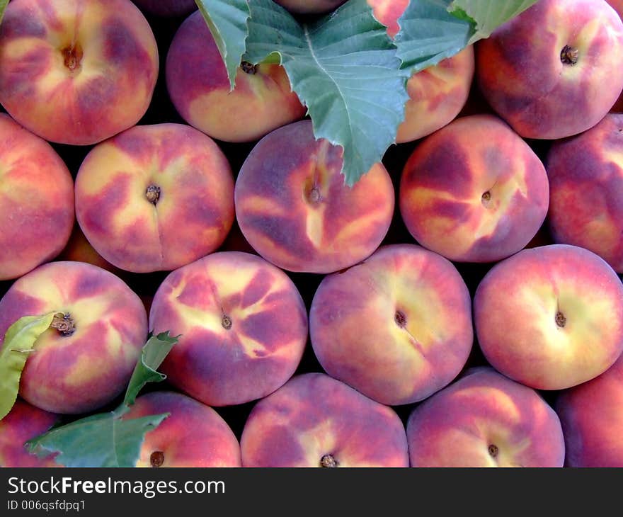 Bunch of peaches on an open market. Bunch of peaches on an open market