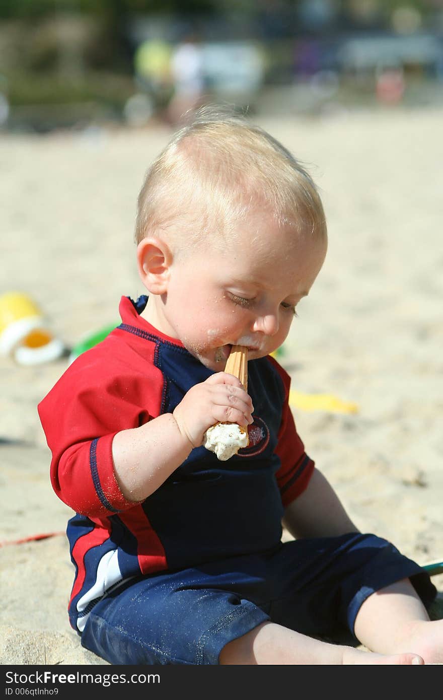 Small child exploring a beach in Cornwall. Small child exploring a beach in Cornwall.