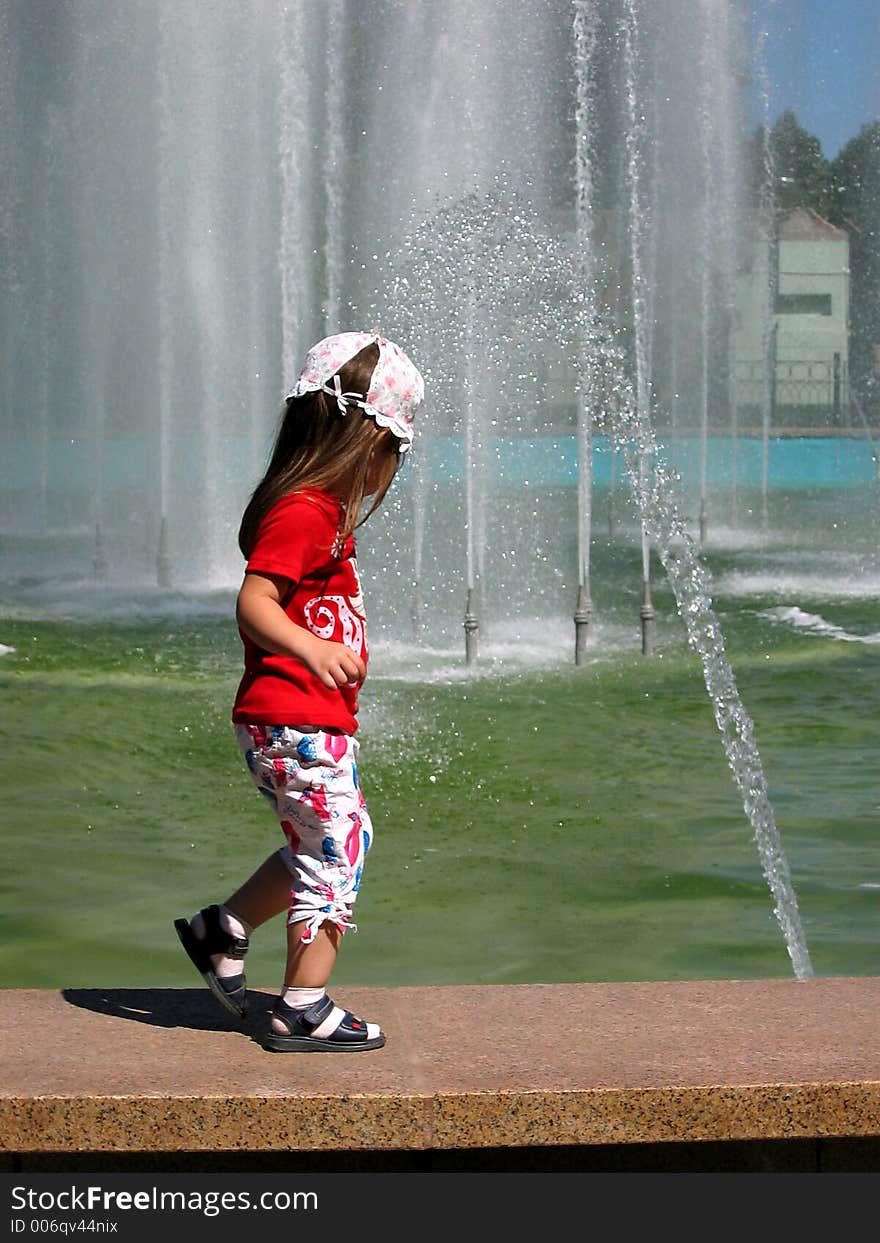 Running girl and fountain. Running girl and fountain.