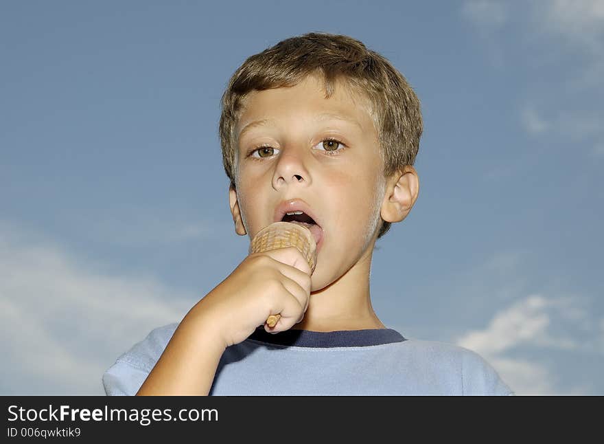 Young Boy Eating a Ice Cream Cone