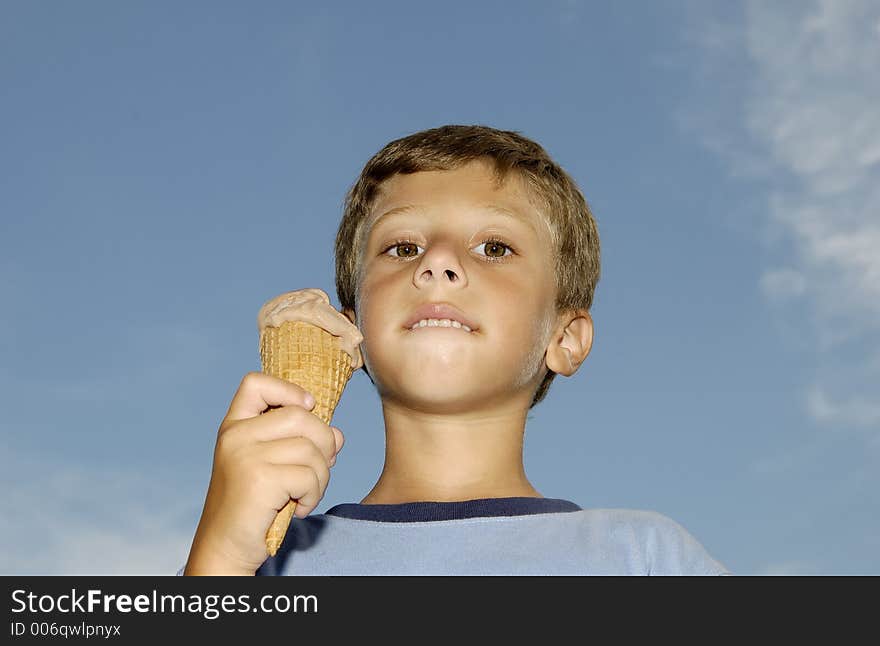 Young Boy Eating a Ice Cream Cone