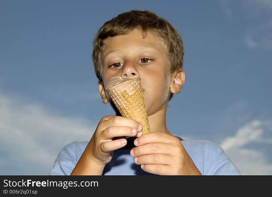 Young Boy Eating a Ice Cream Cone