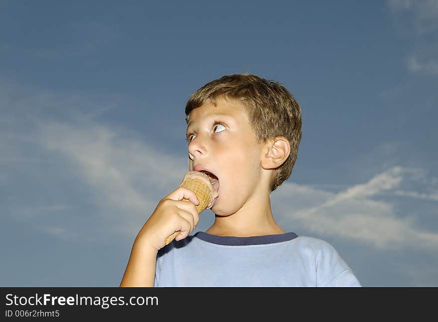 Young Boy Eating a Ice Cream Cone