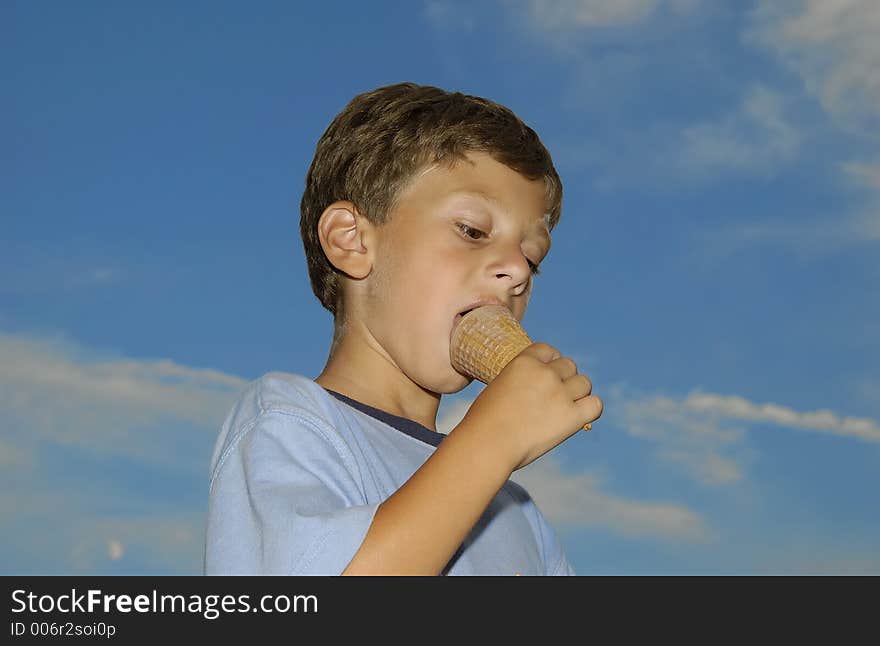 Young Boy Eating a Ice Cream Cone