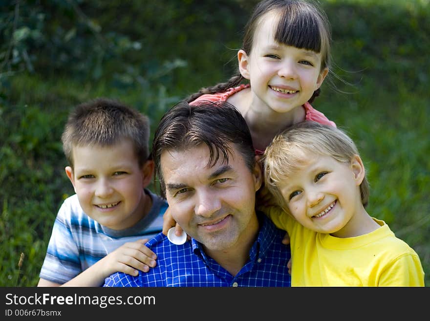 Happy children with uncle. Happy children with uncle