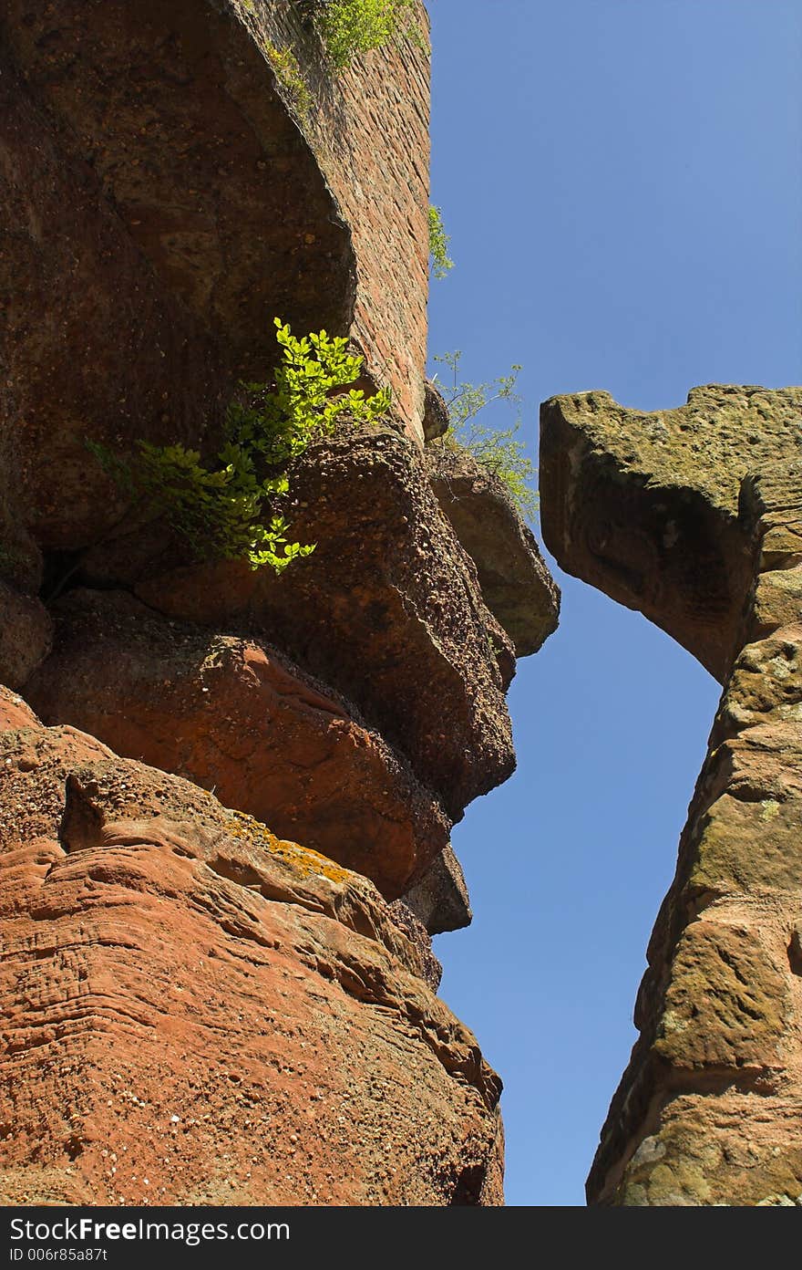 Rock over blue sky