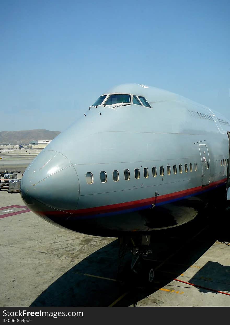 Closeup of cockpit and nose of jumbo jet