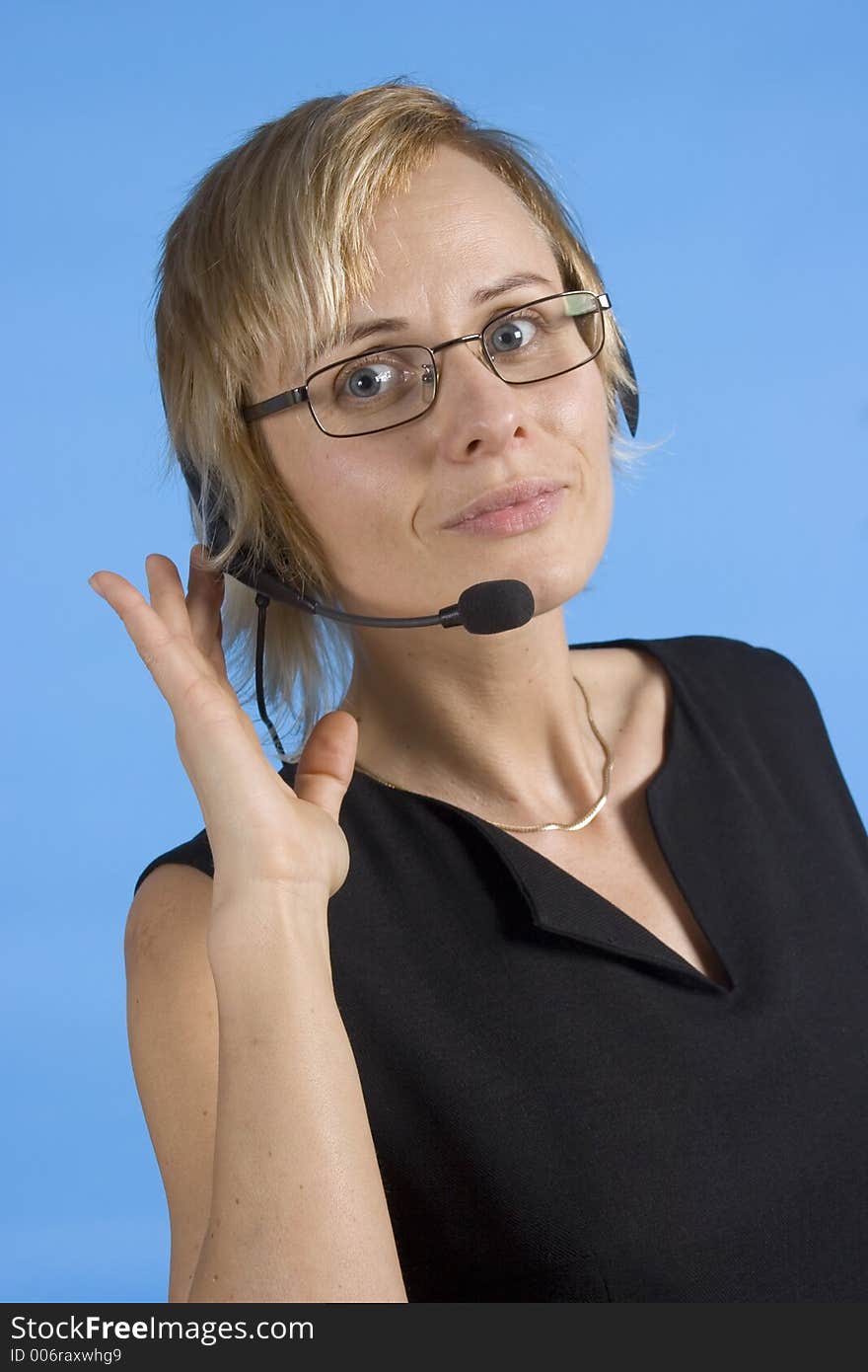 Businesswoman with headphones - smiling