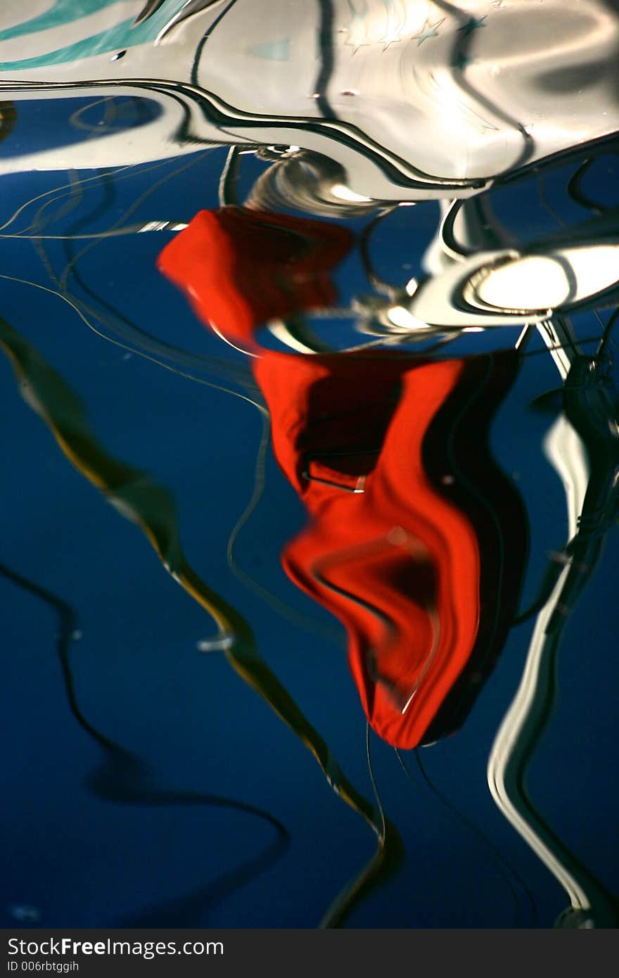 Corsica   Bay of Calvi, reflections of boats in the water