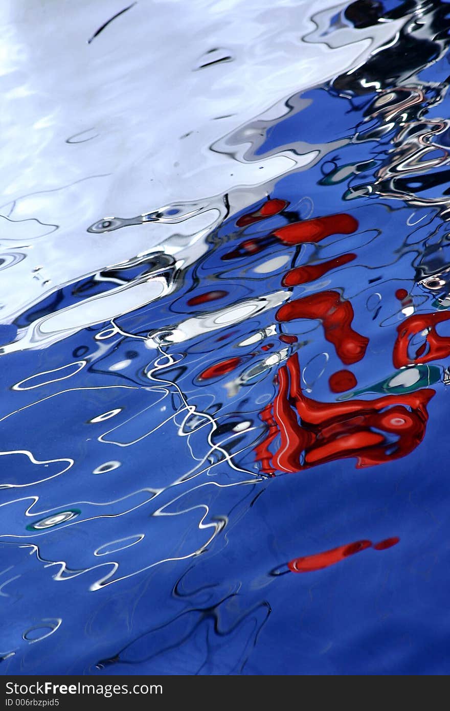 Corsica   Bay of Calvi, reflections of boats in the water