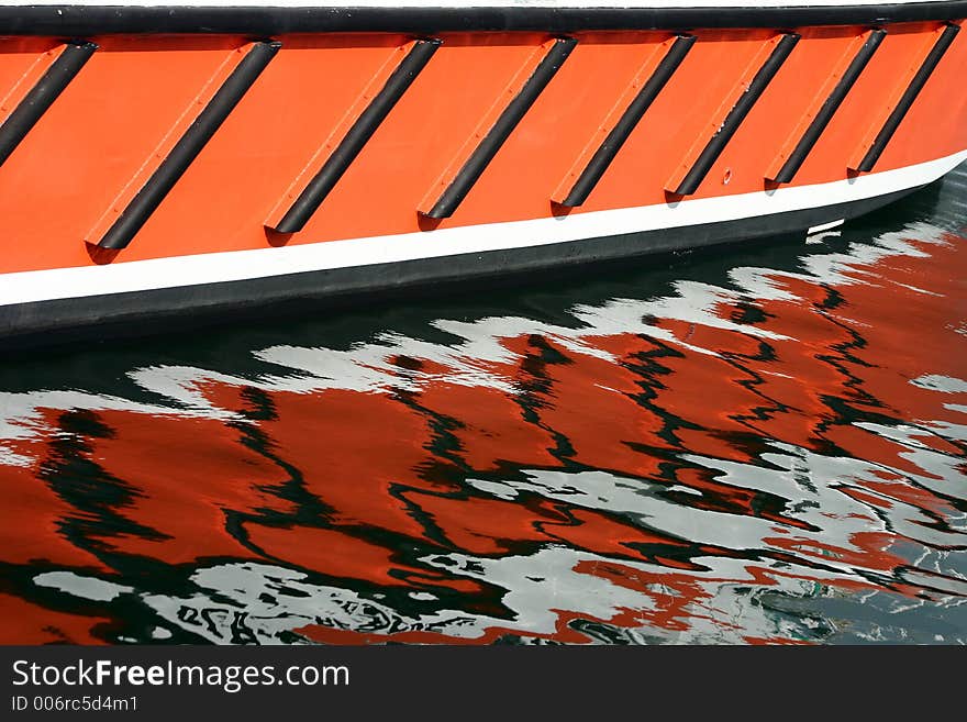 Corsica Bay of Calvi, reflections of boats in the water