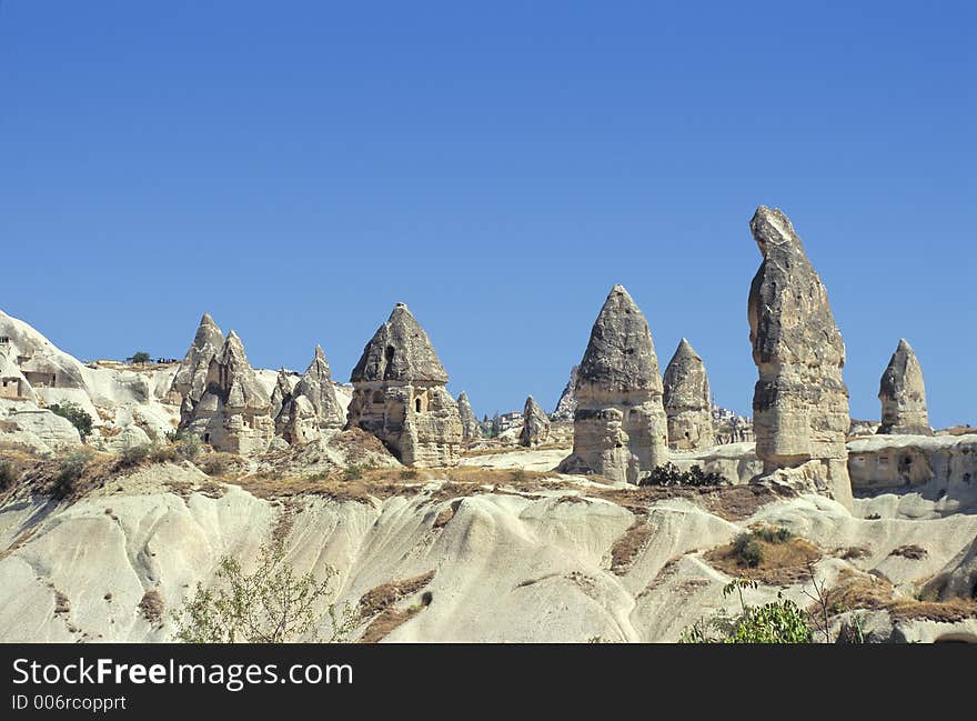 Old destroyed troglodyte houses digged in tuff in Cappadocia, Turkey