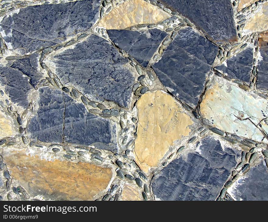 Pavement texture with different stone colors and shapes