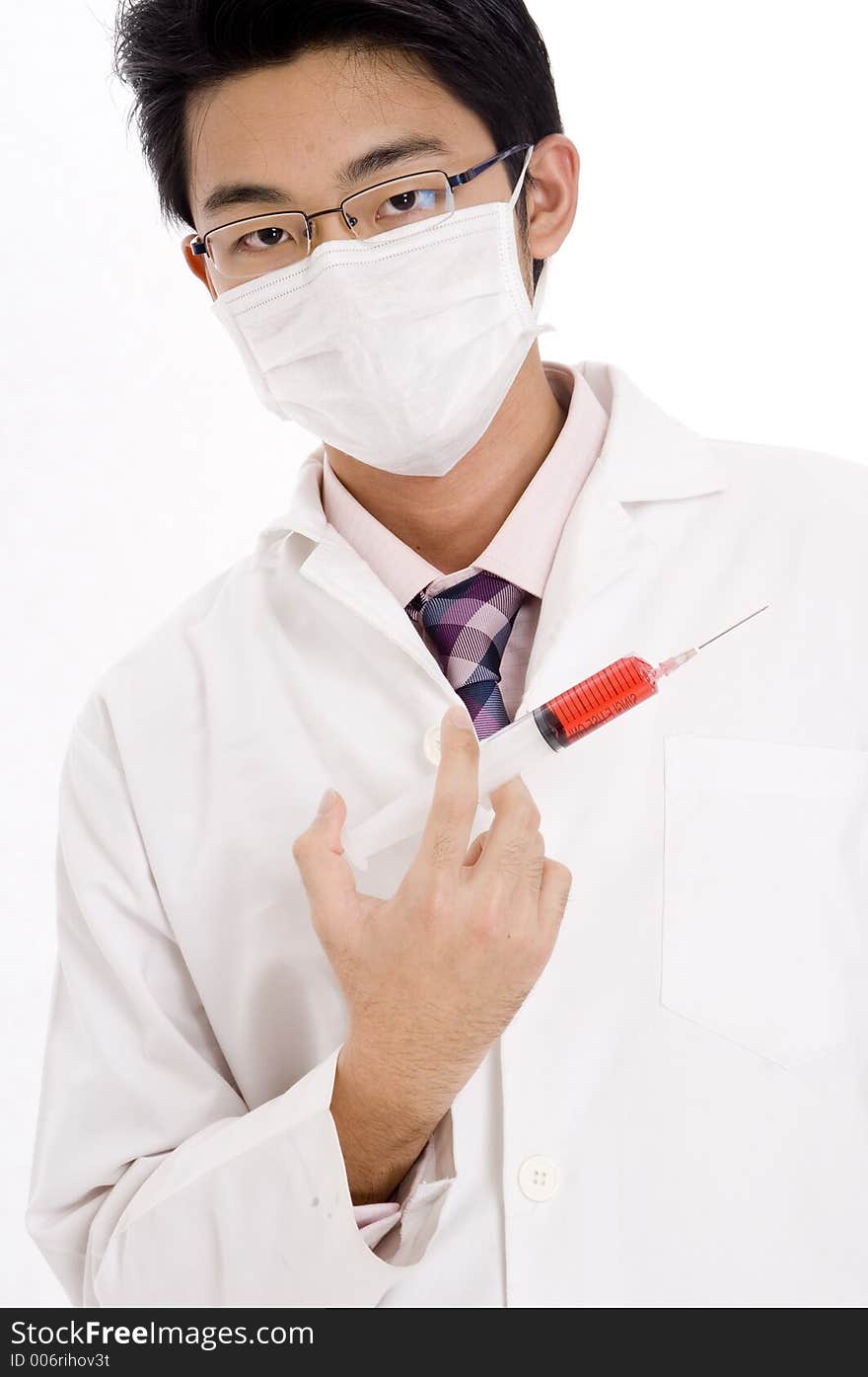 A young asian man in white coat holding lethal drug. A young asian man in white coat holding lethal drug