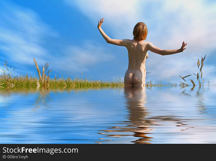 Beauty girl in water under clouds