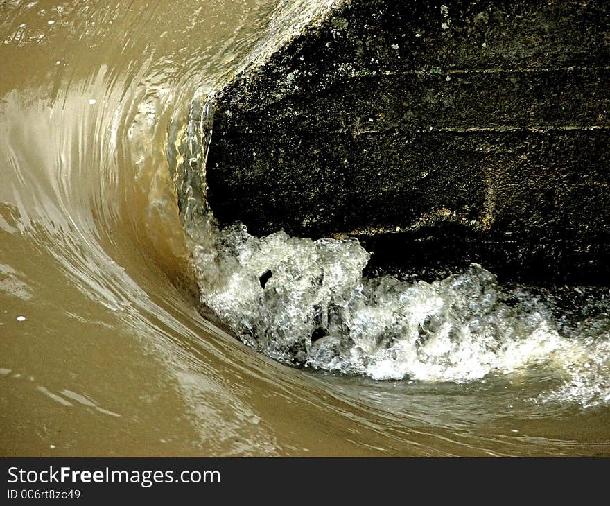 Broken water on the River Hers, south west France as it flows under a bridge after heavy rain. Broken water on the River Hers, south west France as it flows under a bridge after heavy rain