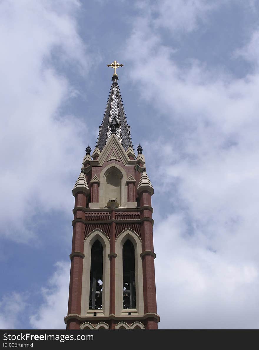 The steeple of a church. The steeple of a church