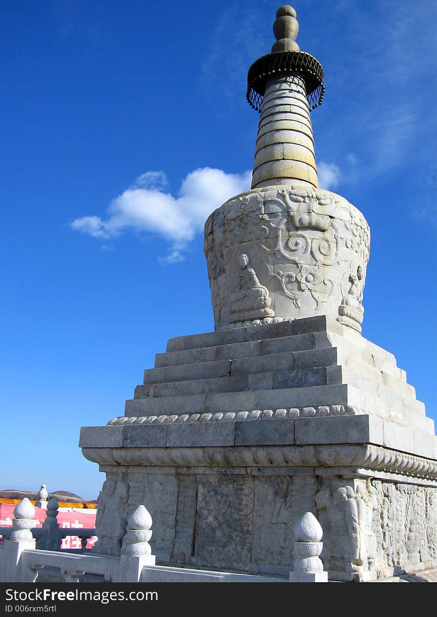 White tower in front of a temple, in china. White tower in front of a temple, in china