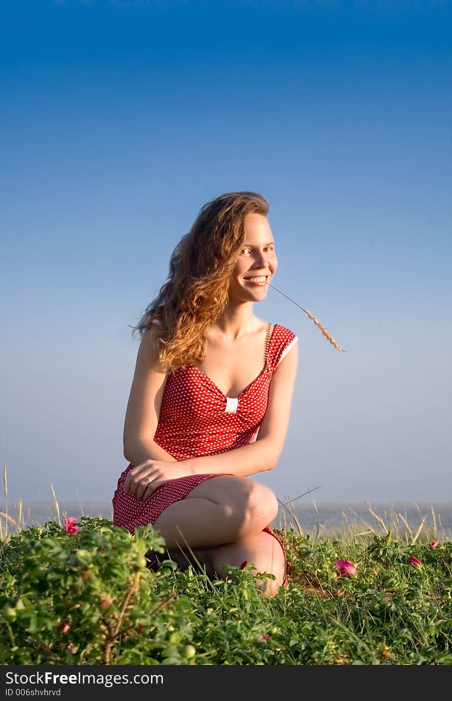 Girl sitting on a dune-10