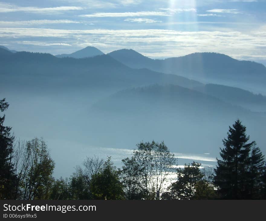 Schliersee, Bavaria, Germany with the misty Alps in the background. Schliersee, Bavaria, Germany with the misty Alps in the background