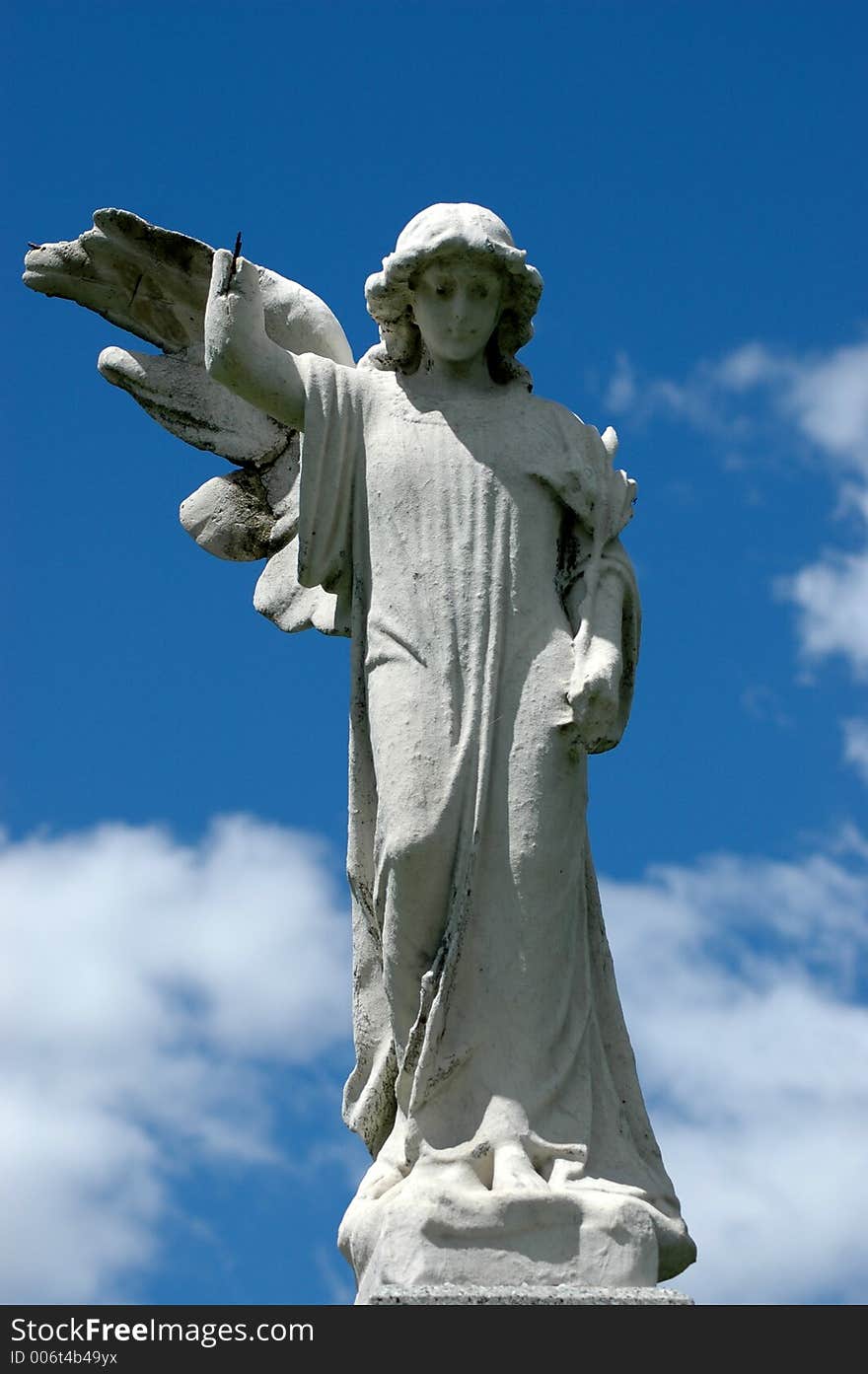 It was a beautiful day and in montreal cemetery i saw this angel and feel sad. It was a beautiful day and in montreal cemetery i saw this angel and feel sad.