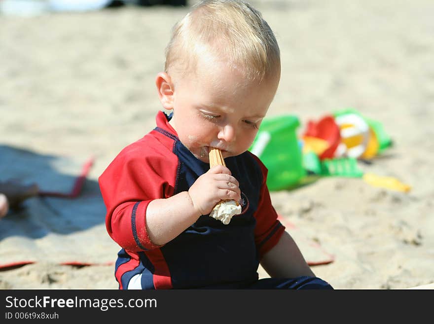 Small child exploring a beach in Cornwall. Small child exploring a beach in Cornwall.