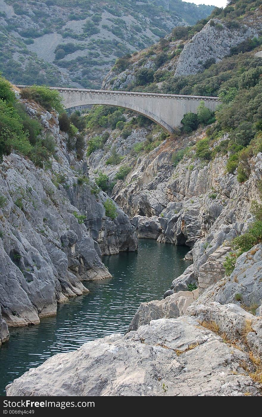 Water bridge over a small river down a canyon. Water bridge over a small river down a canyon