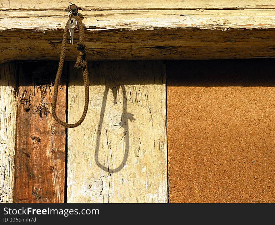 Padlock key hanging on the door