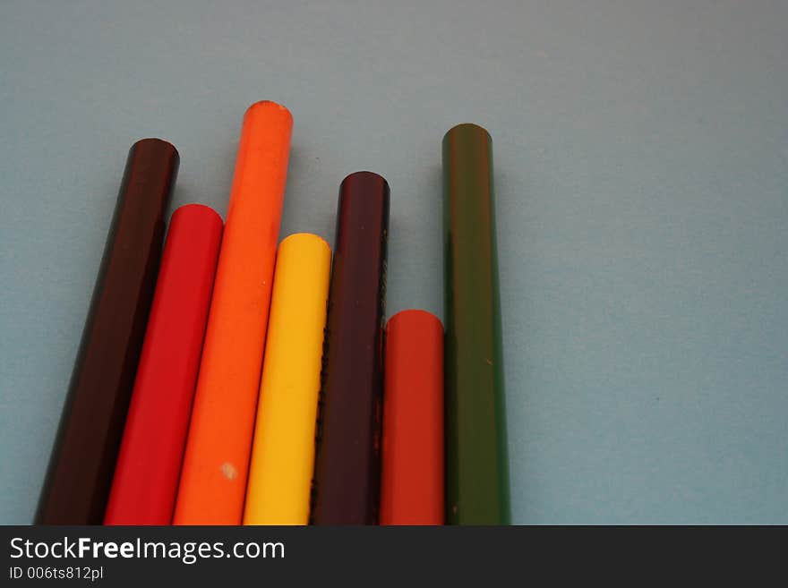 Row of colorful wooden  crayons