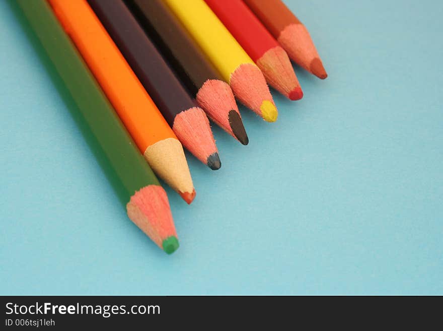 Row Of Colorful Wooden Crayons