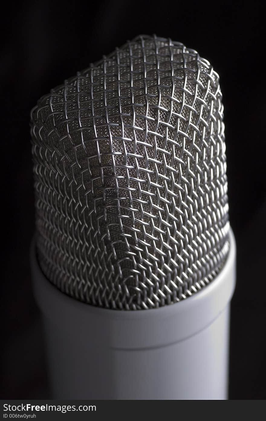 Low key microphone black background