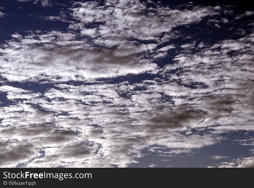 Clouds On Blue Sky Background