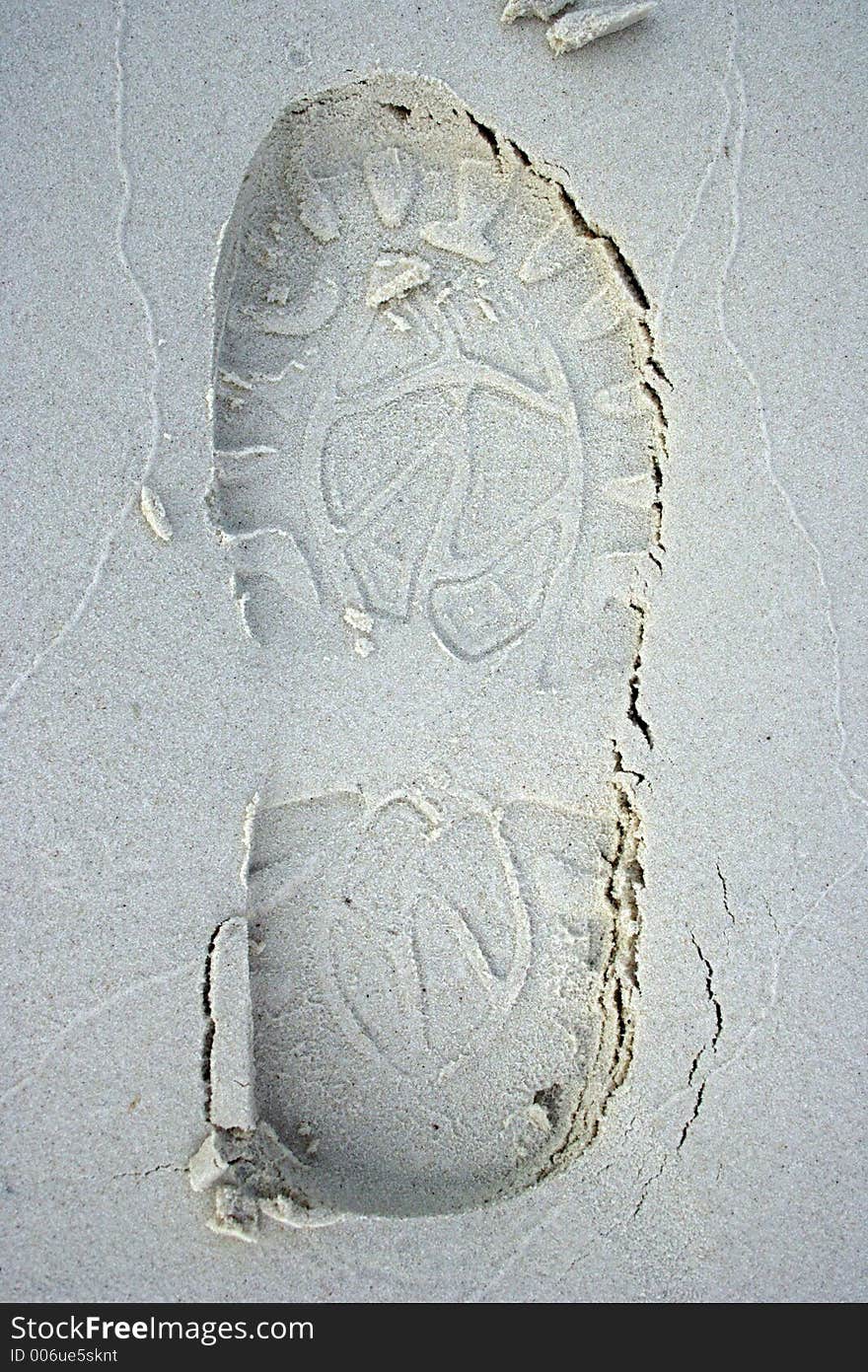 Footprint on the sand.