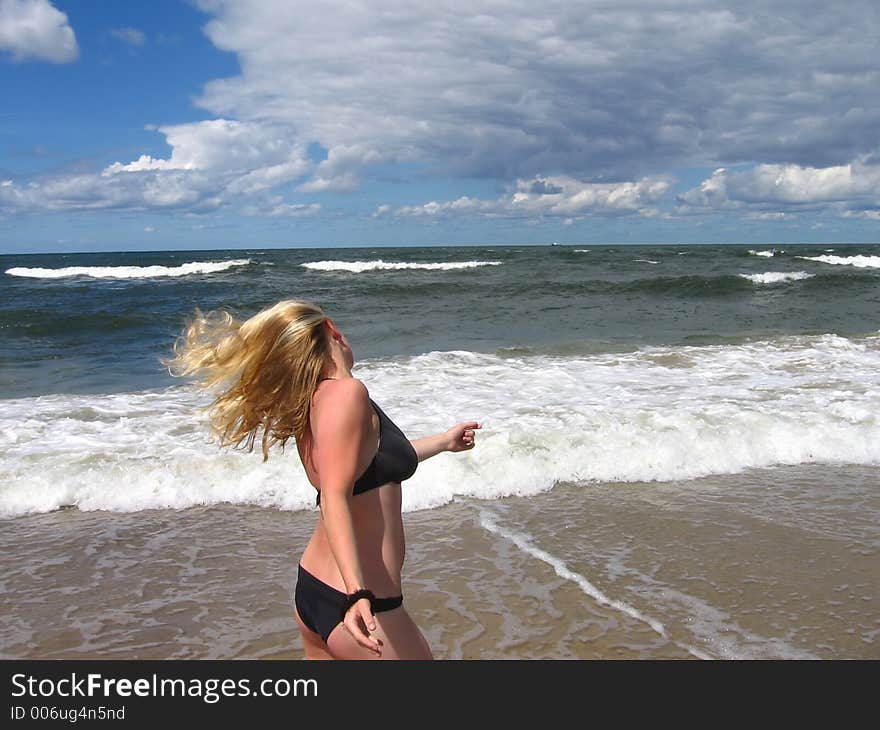 Happy girl on the sea